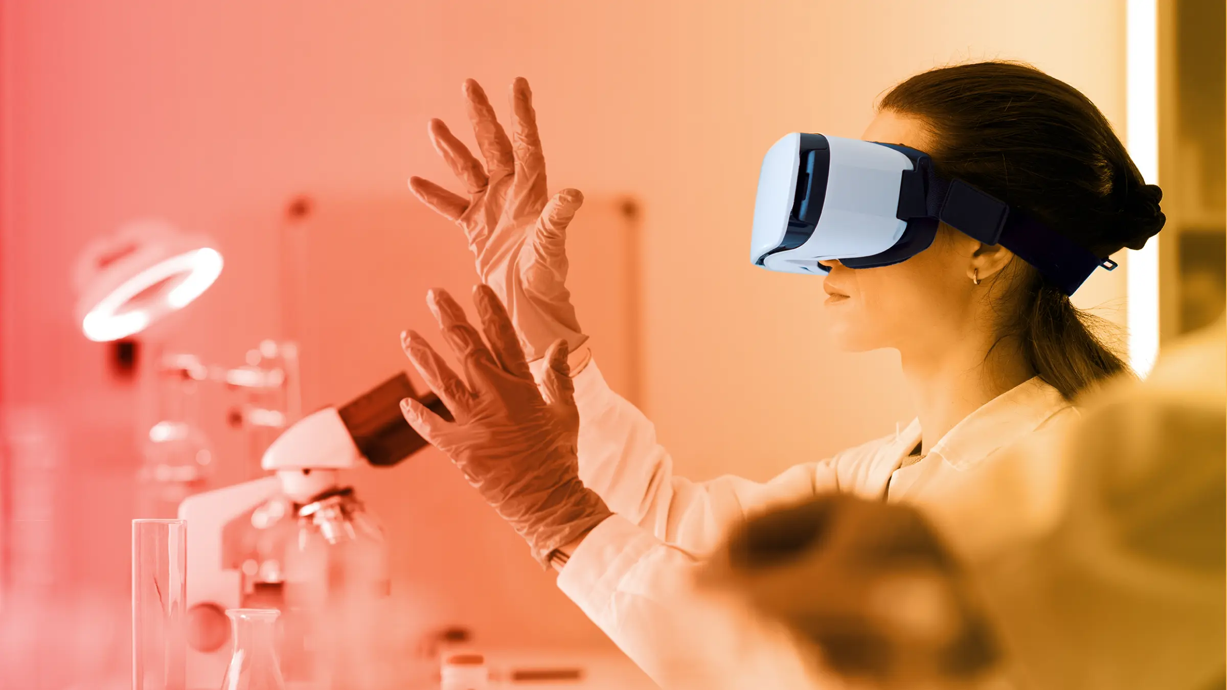 A scientist wearing a virtual reality headset and blue gloves, conducting research in a laboratory filled with microscopes and test tubes.